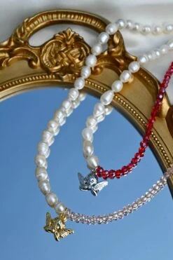 Dreamsbaby Jewels X Dippin Daisys Gold Cherub Necklace 9 Dreamsbaby Jewels X Dippin Daisys Gold Cherub Necklace -WaveLuxe Store DDBJCN PNK gold cherub necklace pink 2